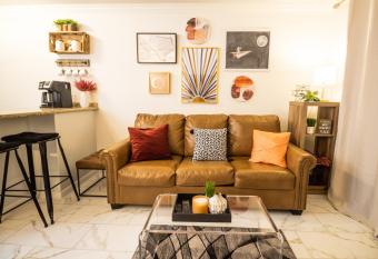 Crimson Beach Escape Ocean View-HotTub -Pool-LongStay - 1 Queen Bedroom plus Alcove bunk Beds and a Sofa has rooms with a private hot tub