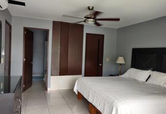 Beach Condo has rooms with a private hot tub