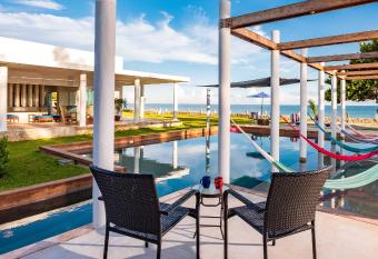 Stunning BEACHFRONT hacienda style property, East of Progreso allows 18 year olds to book a room