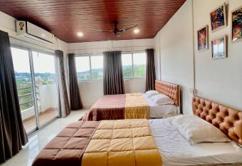 The Upper Homes has Balcony rooms