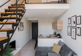 Bright & elegant loft suite in the city center has Balcony rooms