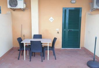 Bilocale RESIDENCE MARASUSA has rooms with a private hot tub