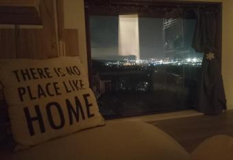 Apartament with nice city view has rooms with a private hot tub