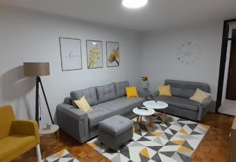 Cozy and sunny apartment near the airport has Balcony rooms