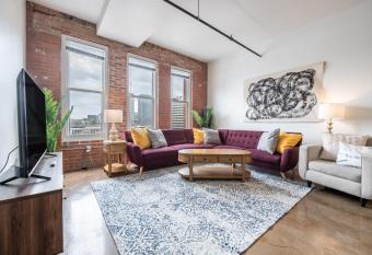 3BR 2BA Luxury Historic Loft With Gym by ENVITAE has Balcony rooms
