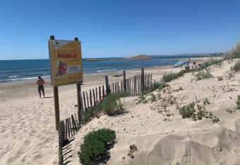 La Mer et la Plage au bout du parc Appartement 4 couchages avec jardin has Balcony rooms