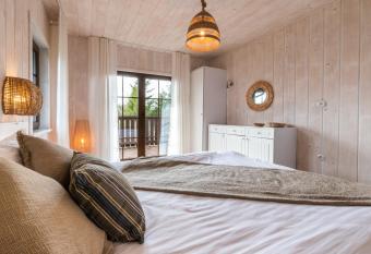 Magia Mazur - Domy Wakacyjne has Balcony rooms