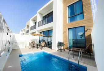 RH- 4BR Private Pool Villa near Beach, Resort in RAK has Balcony rooms