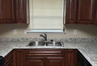 Affordable 4 br vacation home. Near everything! has Balcony rooms