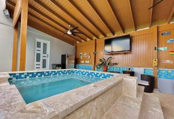 Casa Colinas: El Yunque Rainforest Villa with Pool, Heated Jacuzzi & Terrace has Balcony rooms