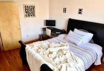 Cheerful, sun-kissed room with workstation allows 18 year olds to book a room