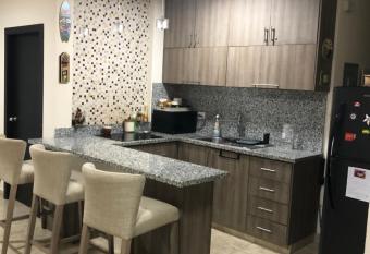 Punta Blanca Departamento has rooms with a private hot tub