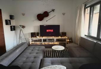 Zoi   s Apartment has rooms with a private hot tub