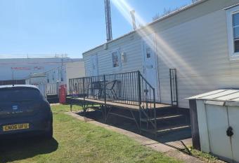 8 berth caravan direct beach access has Balcony rooms