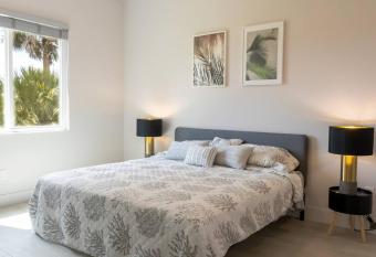 Highest 5 Star Rated Luxury Home 5 Minutes from the Beach! has Balcony rooms