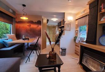 Nice renovated familychalet for 6 persons with a garden and at a cozy campresort in the fantastic north of the Netherlands allows 18 year olds to book a room