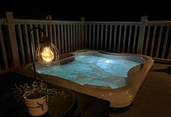 Woodpark Lodge with Hot Tub has rooms with a private hot tub