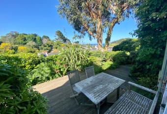     Le jardin de Mimi    Maison has Balcony rooms