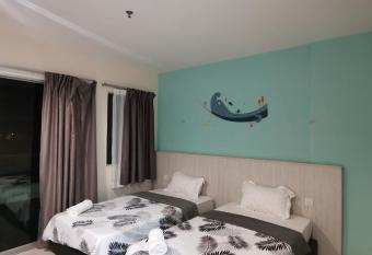 Peaceful 1-bedroom unit at Marina Island by JoMy Homestay has rooms with a private hot tub