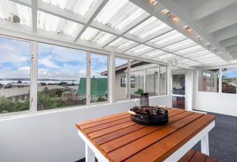 Couches, Bar Table & Kawau View has Balcony rooms