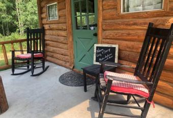 Romantic Tiny Log Cabin with Loft on Creek has Balcony rooms