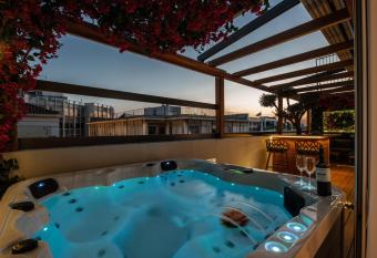 Ethereal Ath  ns has rooms with a private hot tub