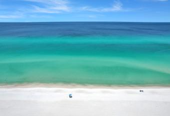 Backyard Beach & Sunsets allows 18 year olds to book a room