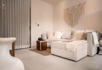 Unique & Stylish Apartment With Lovely Decked Terrace & Awesome Floating Pool In Tulum has rooms with a private hot tub