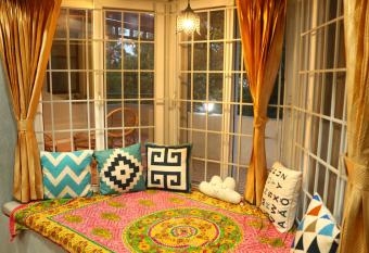 Penthouse 2BHK with Bathtub and Terrace has rooms with a private hot tub