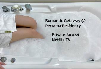 Stylish Romantic Couples Getaway with Private Jacuzzi has rooms with a private hot tub