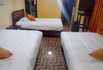 MAQ TAS HOUSE HOSTAL B&B has Balcony rooms