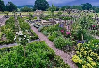 Buittle Castle Exclusive Use- Stay in your own Castle! has rooms with a private hot tub