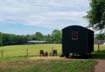 Shepherds hut surrounded by fields and the Jurassic coast allows 18 year olds to book a room