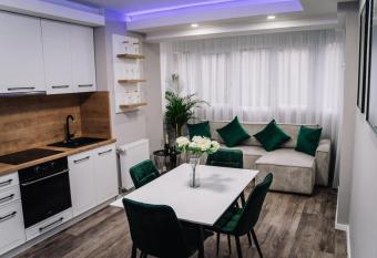 Scandinavian Lux Apartment Oradea has Balcony rooms