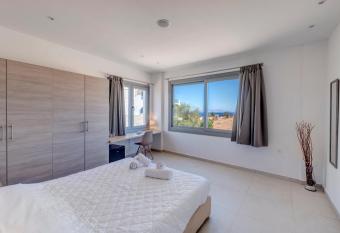 Chrysonisos Suites with Sunset & Seaviews near Kini allows 18 year olds to book a room