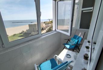 Sunrise Beachfront Relax Studio has Balcony rooms