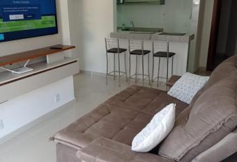 Apartamento de luxo novo pr  ximo a rua de lazer has Smoking rooms