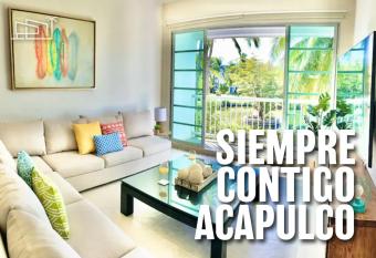 Vista al Lago con balc  n en Mayan Lakes has rooms with a private hot tub