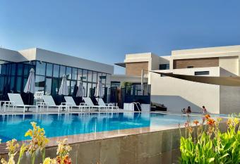 Family vacation villa with access to pool and beach has Balcony rooms