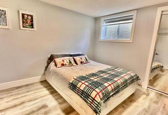 Cozy clean basement suite with designated parking has Balcony rooms