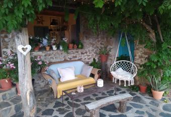 Cortijo La Chaparra 20 minute mountain drive up unmade roads above Lanjaron allows 18 year olds to book a room