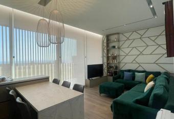 Sunshine Green Coast Apartment has Balcony rooms