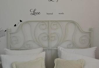 Apartment with swimming pool has rooms with a private hot tub