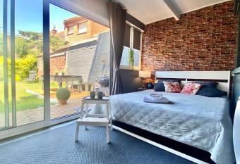 Le Charbon Dor   has Balcony rooms