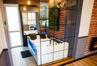 Apartament z jacuzzi w centrum Sanoka has rooms with a private hot tub