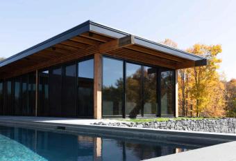 Modern Glass House with Pool & Catskill views in Hudson Valley allows 18 year olds to book a room