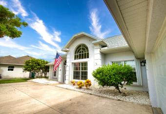 waterfront villa, heated pool, golfing, fishing, white sand beaches has Balcony rooms