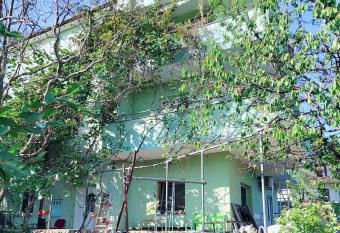 Green house has Balcony rooms