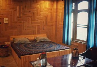 Pine Woods Guest House & Cafe has Balcony rooms