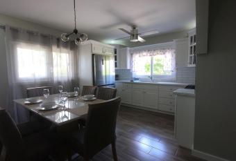 Single-Family Home With Gated Tropical Yard has Balcony rooms